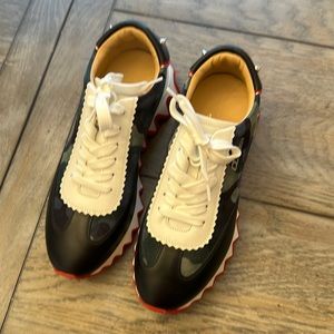 Christian Louboutin loubishark sneaker never worn